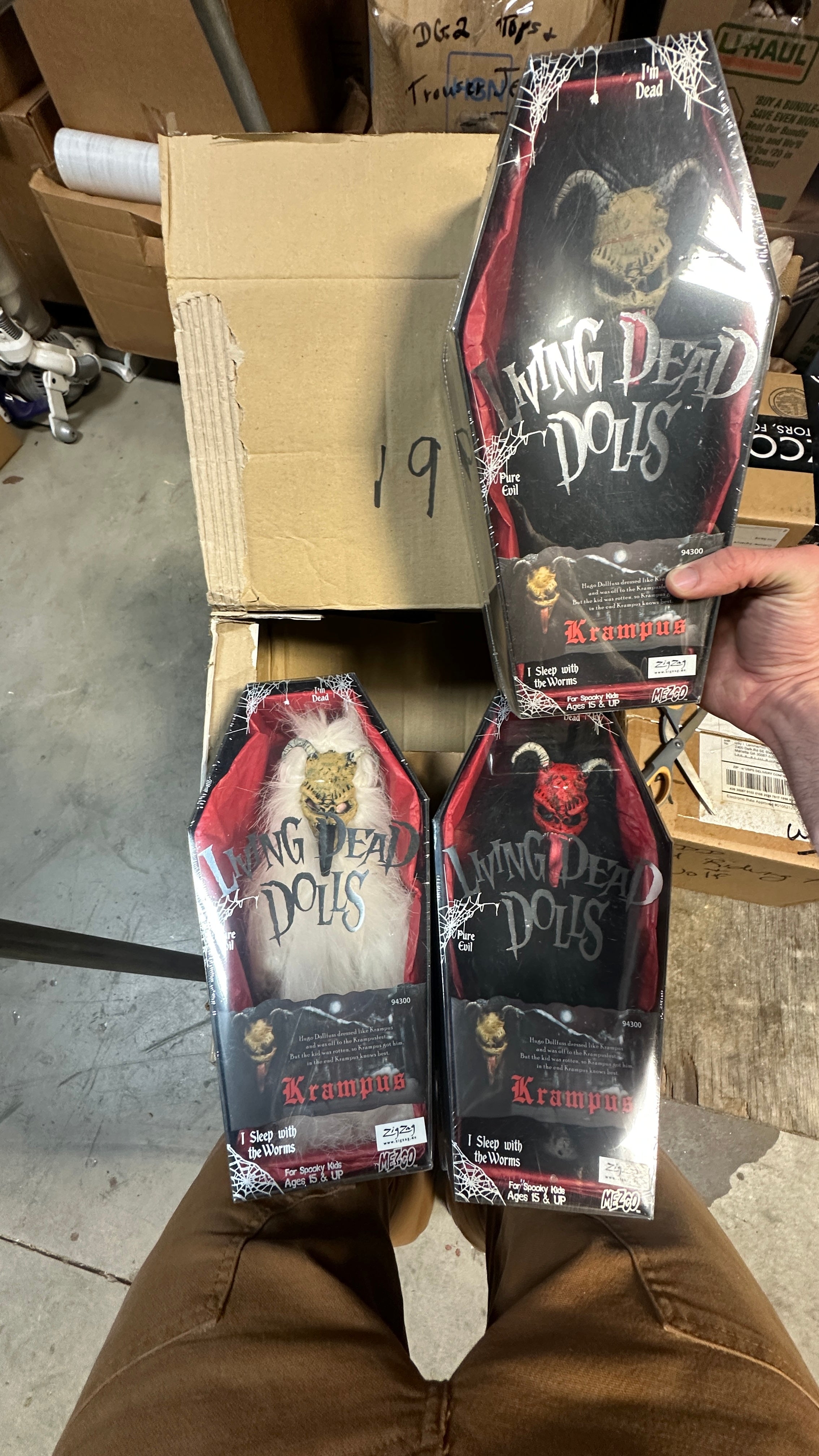 Three dolls: Red/Black, White/Brown, Black/Brown